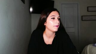 svtf2323 - Cute brunette in clothes teasing in front of the camera and chatting sweetly