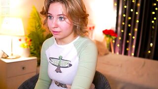 imanora - A babe in clothes teasing in front of the camera and chatting sweetly