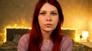 cassie130505 - Skinny babe with red hair wearing clothes tease in front of the camera